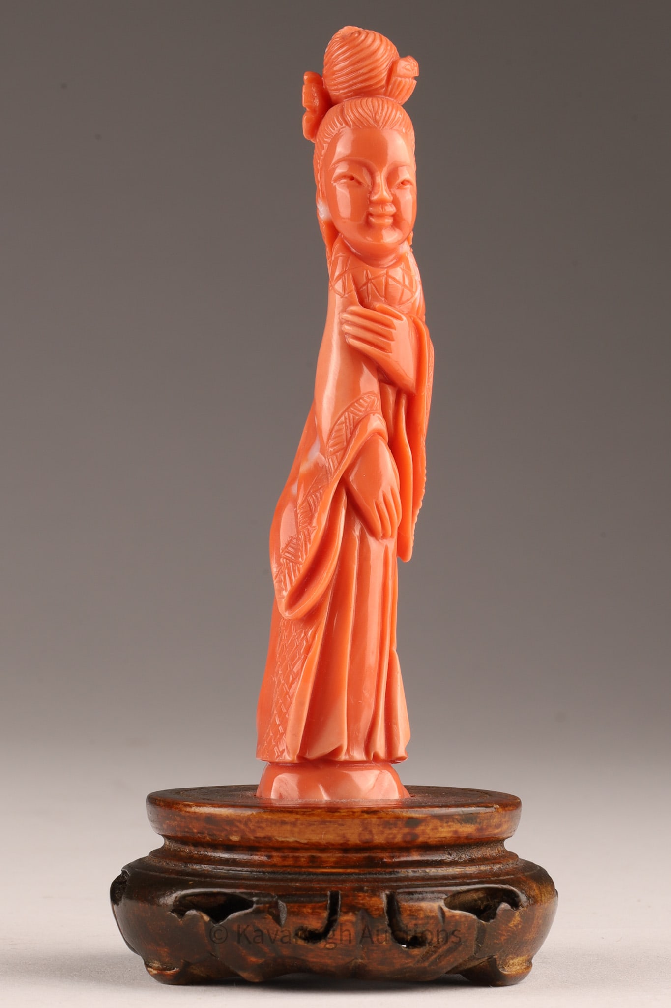 Chinese Carved Pink Stone Guanyin: Chinese Carved Pink Stone Guanyin on Stand. 4 inches H, 5 inches including stand. THIS ITEM CANNOT BE EXPORTED FROM CANADA.