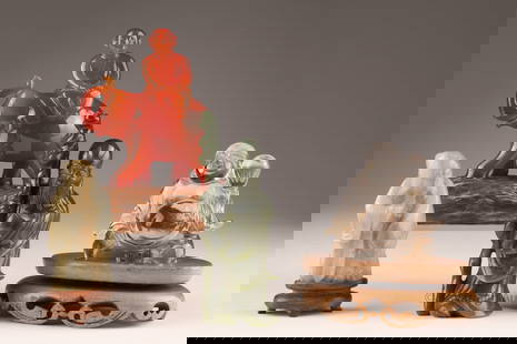 Collection Chinese Carved Hardstone Figures: Collection of four carved Chinese figural items. Rock crystal Seated Buddha measures 3 inches H, spinach green jade Shou Lao figure measures 4 inches H, Carnelian elephant with seated figure carving m