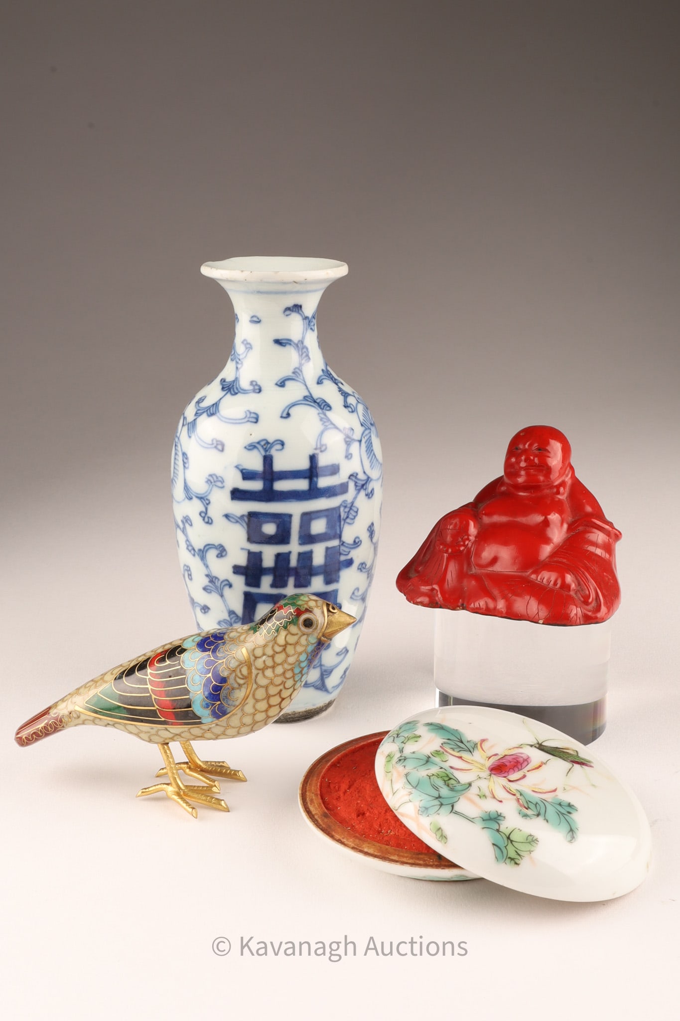 Lot of Antique Chinese Items: Lot of Antique Chinese Items. Double Happiness blue and white porcelain vase measures 5 inches H. Red seated Buddha measures 1.5 inches H x 2 W, Cloisonne bird measures 4 inches L x 2 H, Famille Rose