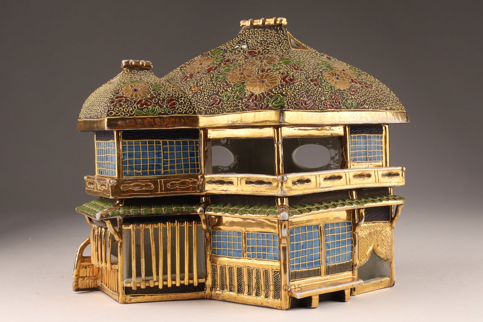 19th C Japanese Satsuma Cottage or House Box: 19th C Japanese Satsuma Cottage or House Box. Decorated with gilding, raised enamel and moriage decorations. Some small breaks to window bars, loss to gilding in places. 8 inches H x 10 L x 5 deep.