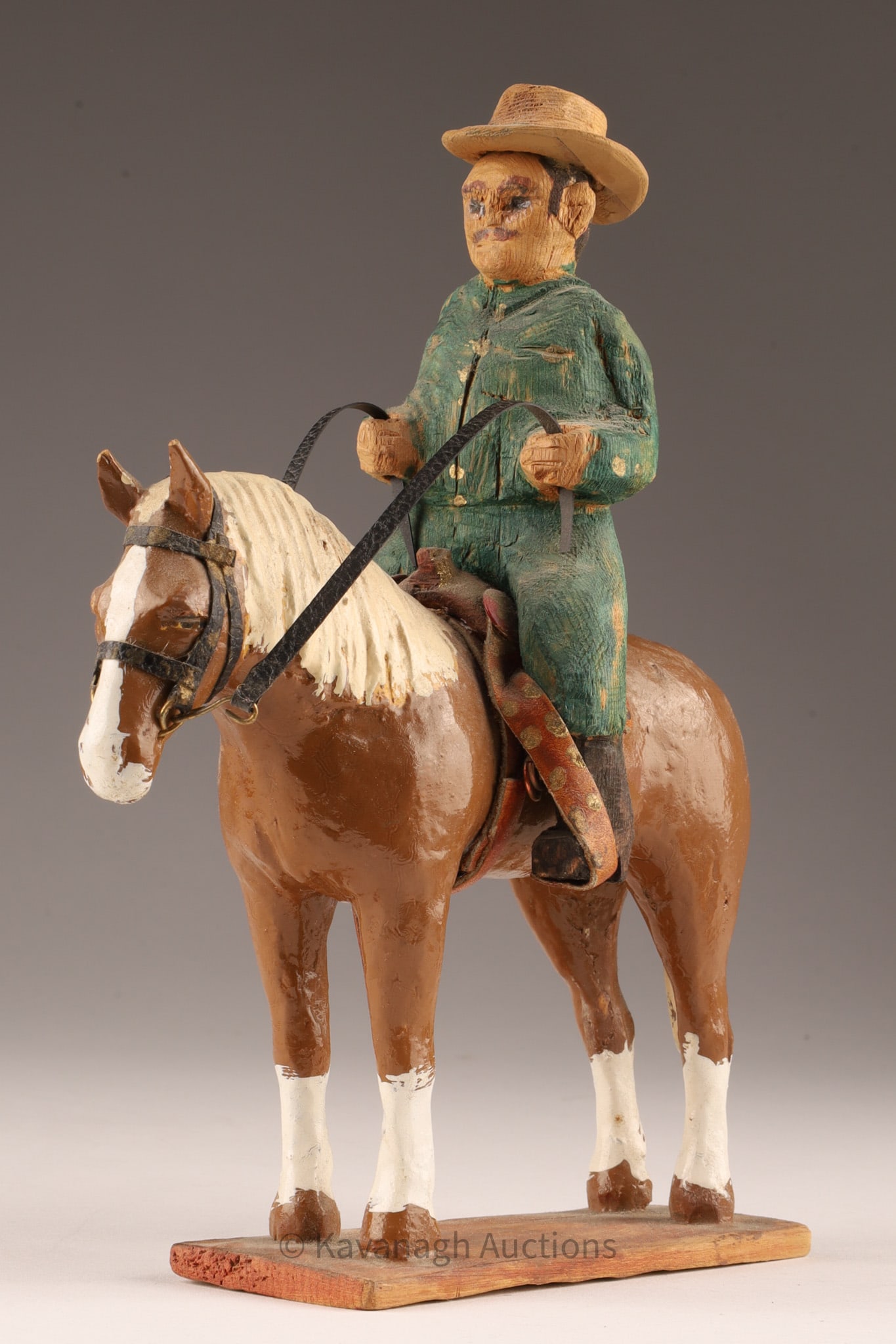 Percy Bezanson Nova Scotia Carving Cowboy C. 1960: Percy Bezanson (1905-1990) Brickton, Nova Scotia Folk Art Carving of a Cowboy on Horseback C. 1960. 7.5 inches H x 7 W x 3 deep.