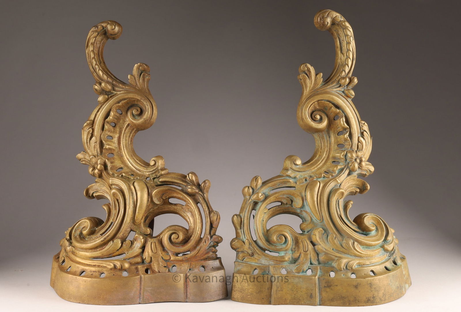 Pair 19th C Louis XV Style Bronze Chenets Andirons: Pair 19th C Louis XV Style Bronze Chenets Andirons, rococo-style design, featuring curved lines, asymmetry, and intricate scrolling patterns. 10 inches W x 16 H.