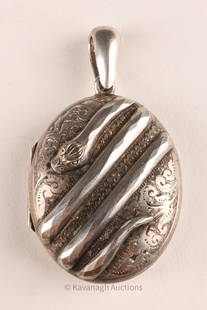 Victorian Sterling Locket with Applied Snake: Victorian Birmingham Sterling Silver Locket with Applied Snake, hallmarked David and Lionel Spiers, C. 1882. 13.7 grams, measures 2.25 inches including bail.