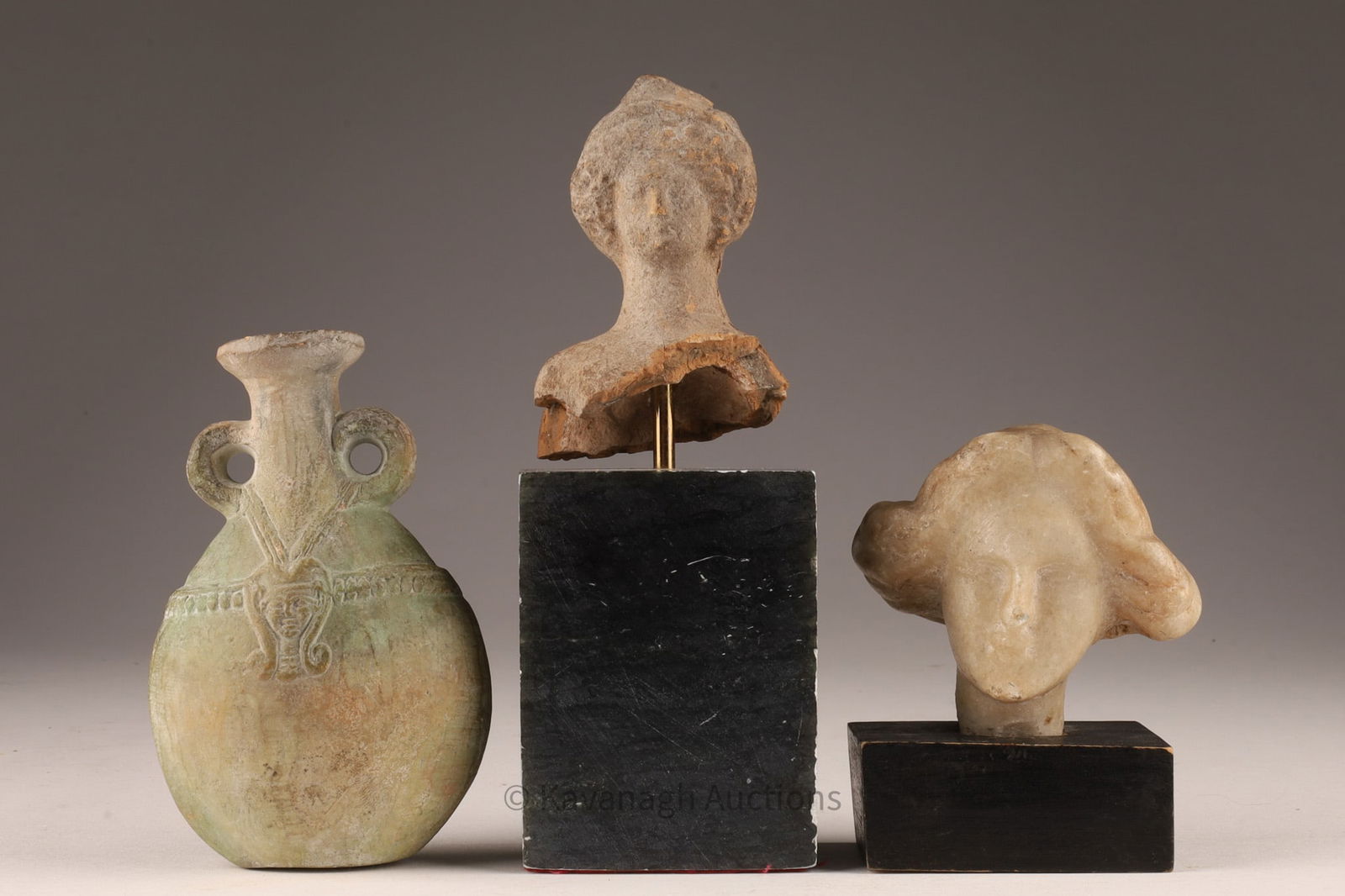 Lot Classical Greco Roman Busts, Egyptian Vessel: Lot of Classical Greco Roman Busts, Egyptian Vessel. Egyptian pilgrim flask measures 4.25 inches H x 2.75 W, Greek or Roman terracotta bust on marble plinth measures 6.5 inches H, bust measures 3 inch