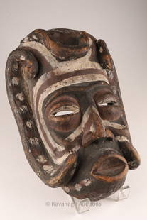 Large Papua New Guinea Sepik Mask: Large Papua New Guinea Sepik Mask, carved and polychrome painted face mask measuring 16 inches L x 11 W x 5 deep.
