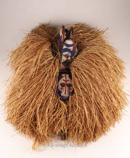 African Yaka Bayaka Tribe Congo Kakunga Mask: African Yaka Bayaka Tribe Congo Kakunga Mask decorated with raffia and polychrome geometric decoration. Approximately 20 inches H x 16 W.