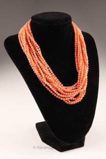 Angel Skin Coral Multi Strand Necklace 14K Gold Lou Goldberg: Multi strand torsade styled angel skin coral bead necklace, 12 stands of fine bead coral, partially individually knotted, set with heavy ribbed 14Kt gold clasp, clasp marked Lou for Canadian jeweller