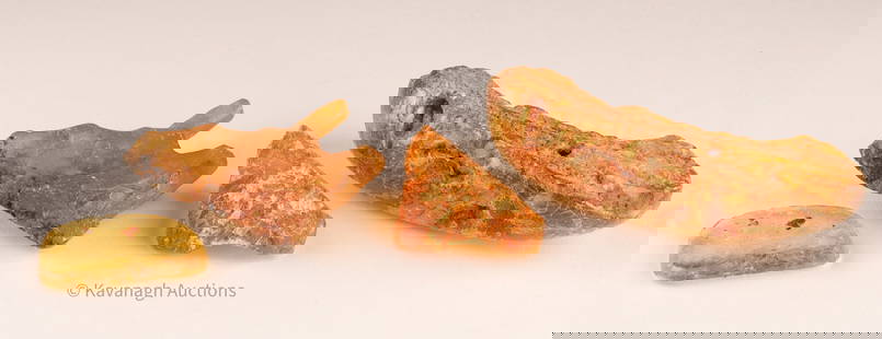 A lot of Three Large Raw Amber Specimens: A lot composed of three raw amber specimens. The first, a Copal amber specimen from Sambava, Madagascar, 71mm at largest point. A Kauri Gum specimen from New Zealand of 45mm at the largest point and a