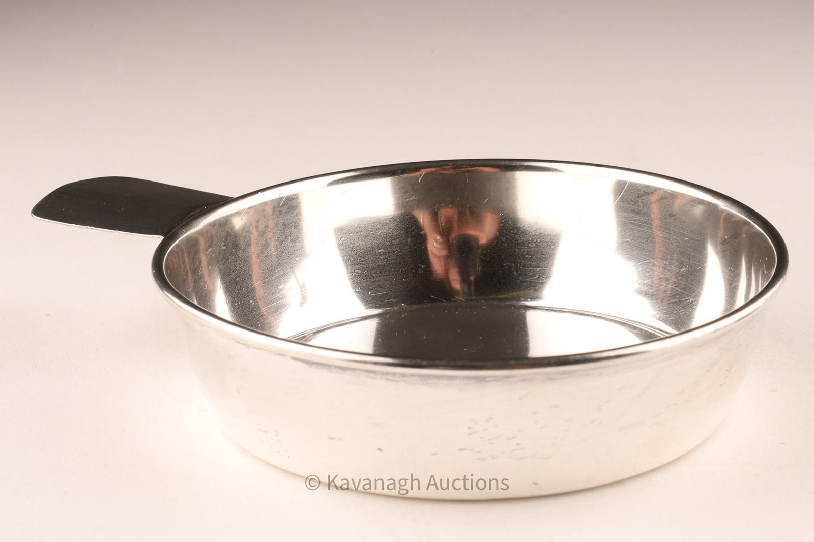 Carl Poul Petersen Canadian Silver Wine Taster: Rare Canadian sterling silver wine taster or tastevin in a modernist design with hand hammered handle, made by Carl Poul Petersen of Montreal, Quebec, marked on base PP Petersen Handmade Sterlingweigh