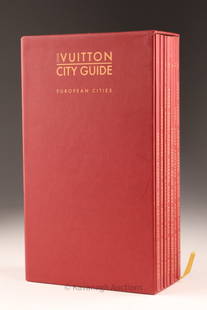 Louis Vuitton European City Guide 7 Volume Set: Louis Vuitton City Guide 7 volume set of European cities C. 1998, soft cover and set in burgundy covered holding case. I - Paris, Marseille, Toulouse / II - London, Dublin, Bruxelles, Anvers / III - A