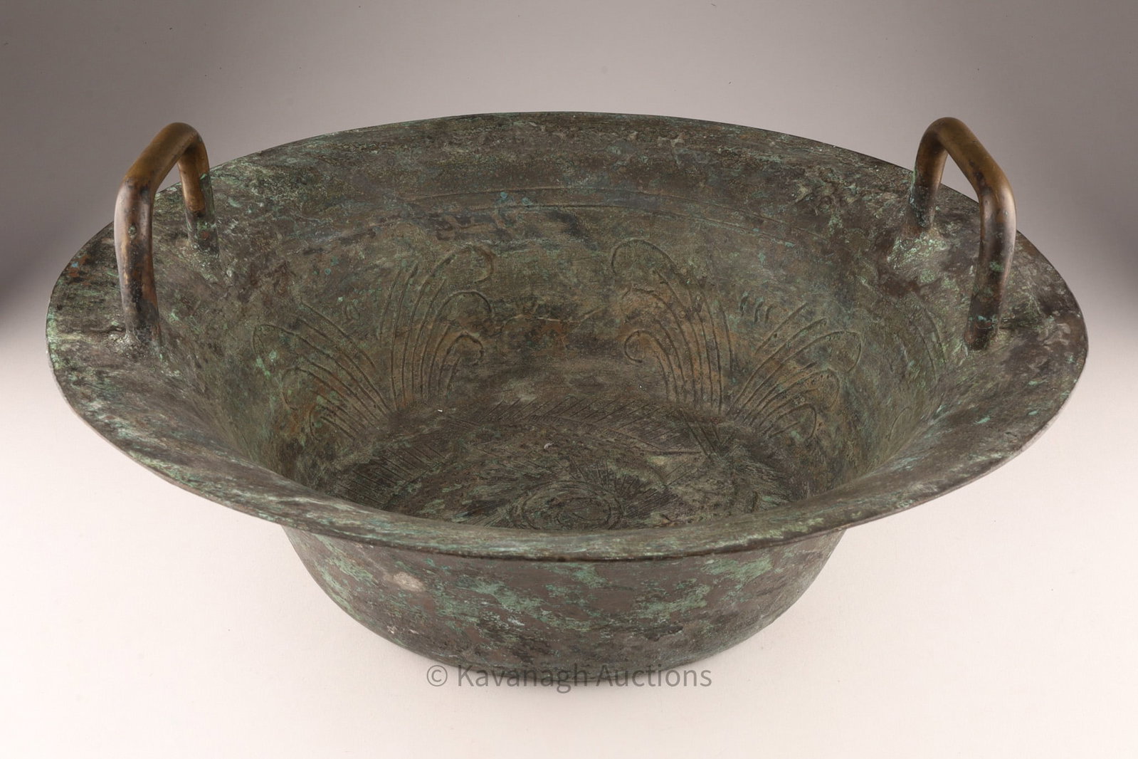 Antique Chinese Ceremonial Bronze Bowl – “Yu?? Fish Symbol: A substantial antique Chinese bronze ceremonial bowl, decorated with the auspicious fish (yu) motif.. Measuring approximately 15.5 inches in diameter. Good condition; age-related patina, minor oxidati