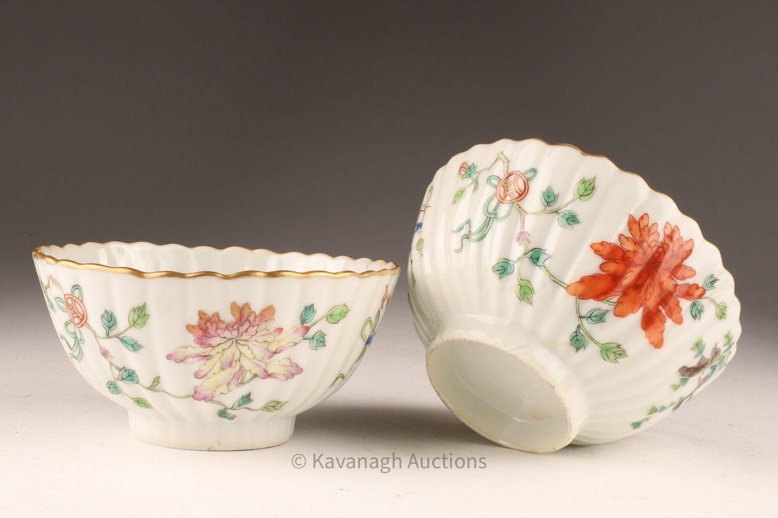 Pair of Antique Chinese Qing Dynasty Petal Form Bowls: Pair of Antique Chinese Qing Dynasty Petal Form Bowls decorated with finely painted floral bouquets. Ribbed and scalloped form and edge.. 4.25 inches diameter x 2 H. One restored with large chip to ri