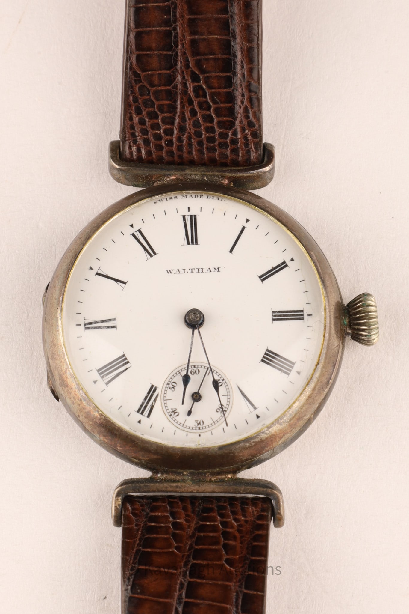 WWI Waltham Roman Numeral Sterling Trench Watch: WWI Waltham Roman Numeral Sterling Trench Watch with inset second hand. Functional.. 3.5 x 3.5 cm, strap measures 10 inches total. We recommend all watches be serviced.