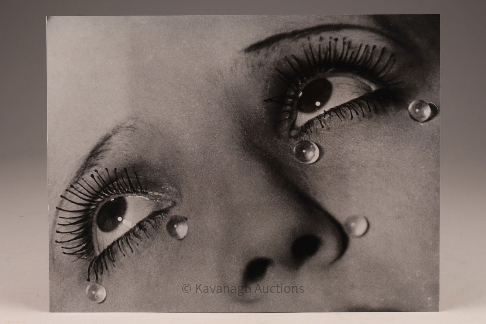 Man Ray Photograph - Les Larmes or Glass Tears 1930: Man Ray - Les Larmes (Glass Tears), 1930 A striking two-colour print of Les Larmes (Glass Tears), one of Man Ray’s most iconic and enigmatic photographs. This edition is enhanced with a glossy varni