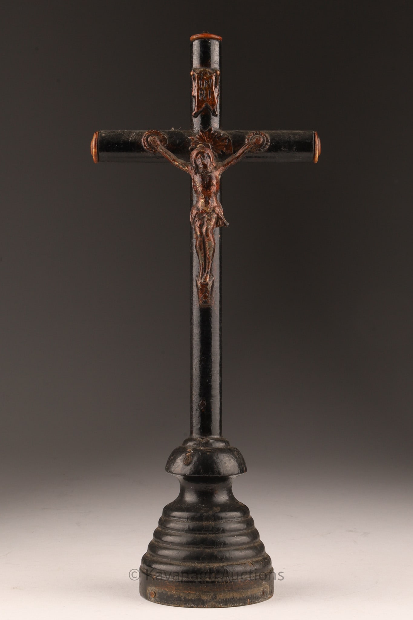 19th C. Antique French Ebonized Wood, Metal and Bone Altar Crucifix: A finely crafted antique French altar crucifix, composed of ebonized wood, with metal mountings and a detailed carved figure of Christ. The crucifix measures approximately 11 inches in height by 4.25
