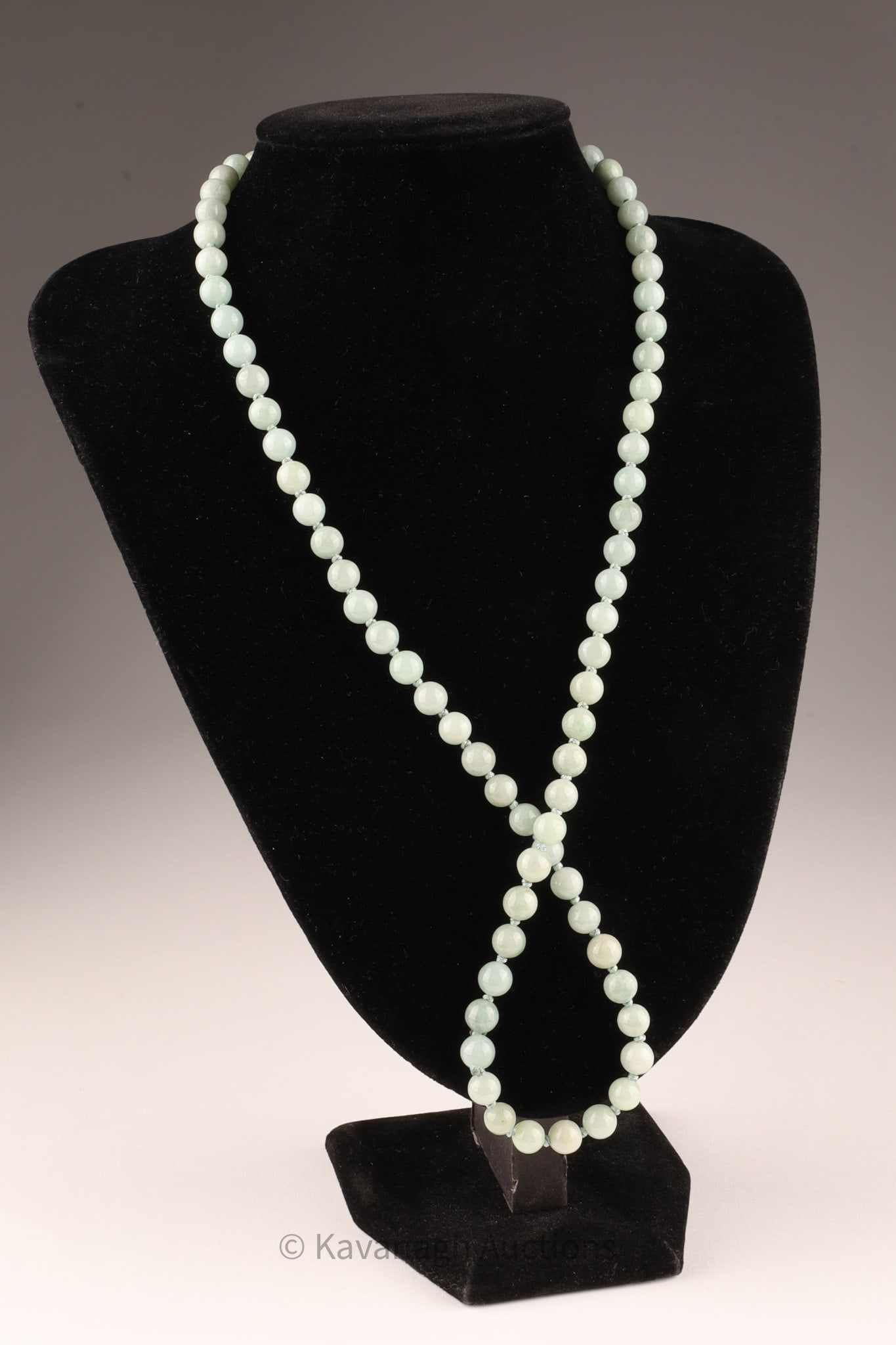 Chinese Light Green Jade Beads Necklace: Chinese Light Green Jade Beads Necklace, individually knotted. 26 inches L.