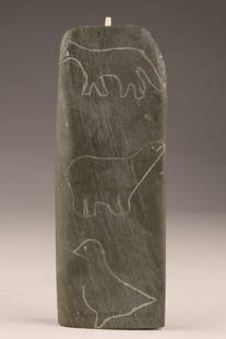 Shavekok Ningeochaak (Coral Harbour, 20th C) Steatite Engraved Plaque: A flat stone plaque engraved on one side with Arctic wildlife motifs including a polar bear, bird, and fox, and on the reverse with an Inuit figure in traditional clothing beside an igloo. The piece