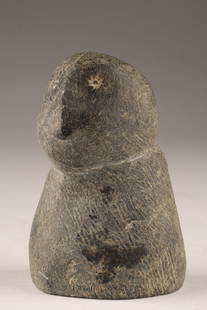 Vintage Inuit Soapstone Carving of a Figure, Morjun AK, 3.25 in.: A charming vintage Inuit stone carving depicting a stylized human figure with simplified features and rounded form. Hand-carved from dark grey soapstone, the piece has a primitive and abstract
