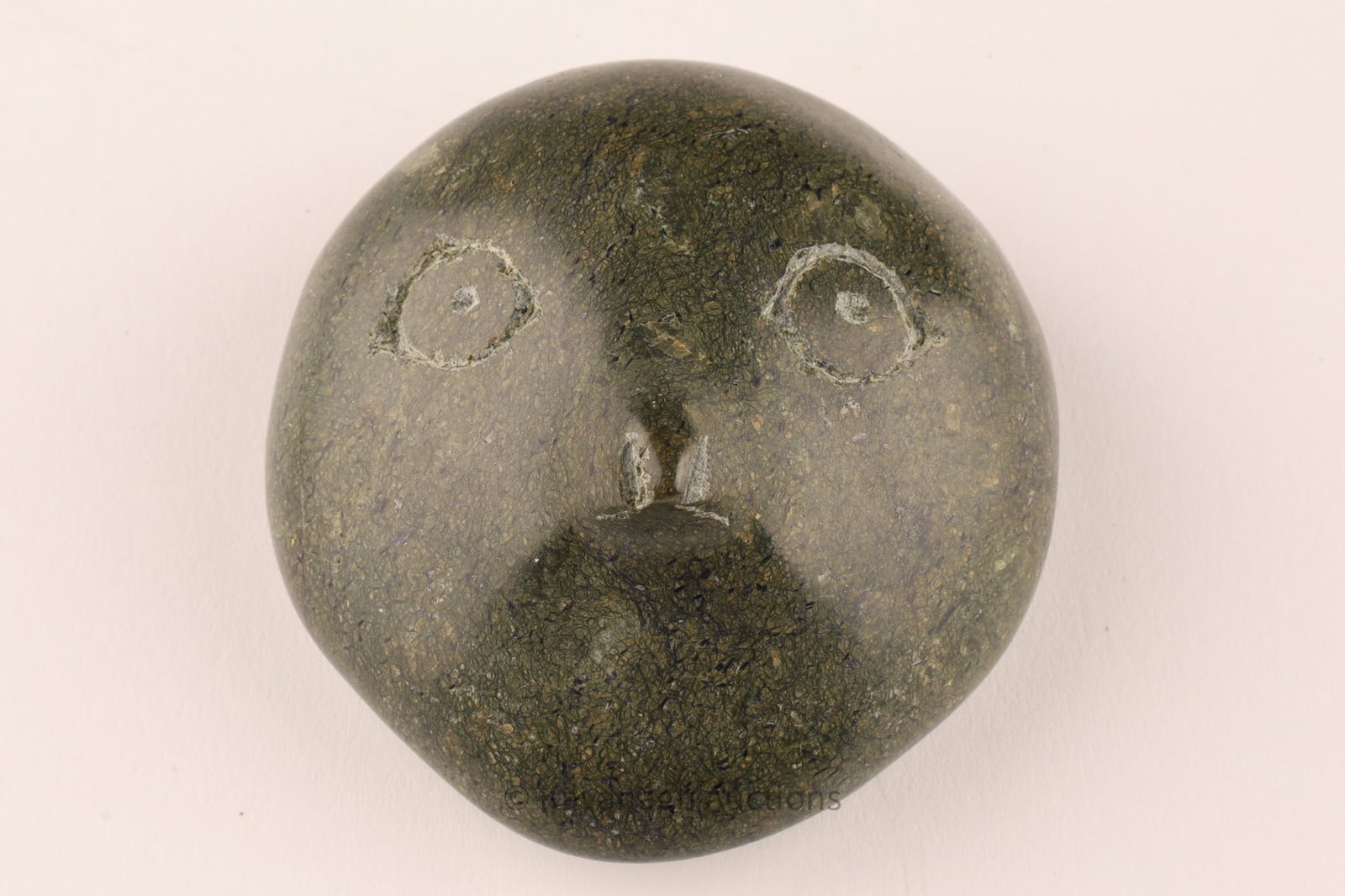 Pudlo Saila (1916-1992, Cape Dorset / Kinngait) Face in Stone Carving (1 of 6)