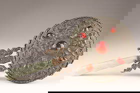 Antique Chinese Jade-Handled Mirror with Bat Motifs and Carnelian Inlay: Chinese White Metal and Jade Hand Mirror with Carnelian Inlay and Bat Motifs, Early 20th Century A finely detailed Chinese hand mirror, the handle carved from pale celadon jade, the reverse in relief