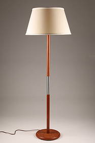 Mid Century Modern Teak Floor Lamp: Mid Century Modern Teak Floor Lamp with Central Brushed Metal Accent. 56”H x 11”D at the base, 19” shade.