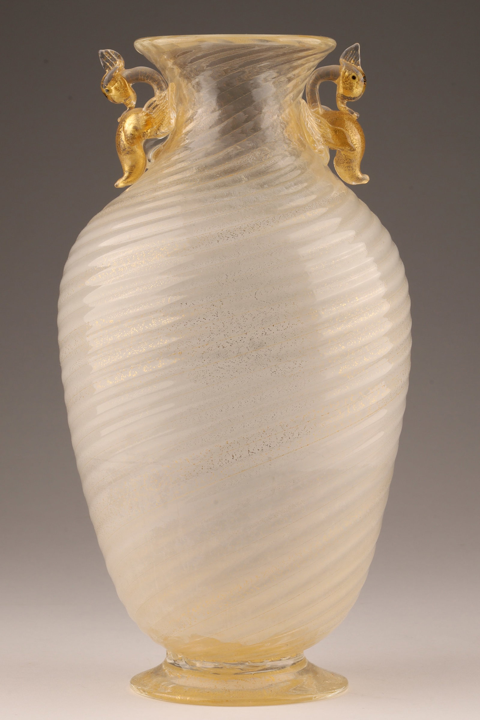 Murano Italian White Swirl Gold Fleck Vase: Murano Italian White Swirl Gold Fleck Vase with Applied Swans at Neck. Measuring 9.5”H x 5”W.