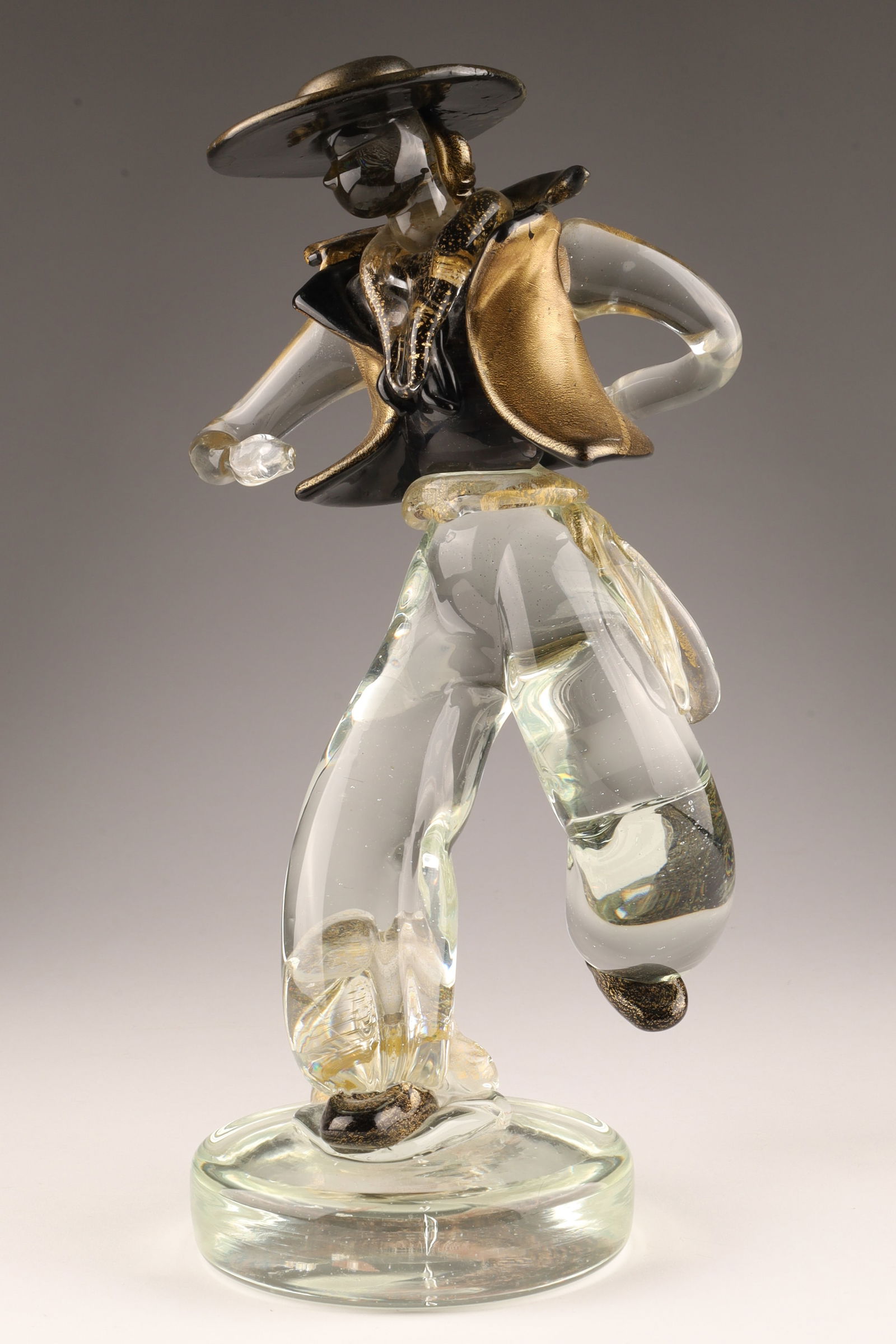 Attributed Barovier & Toso Murano Glass Figure Of A Matador: Attributed to Barovier & Toso Murano Glass Figure Of A Matador in colourless glass with gold fleck and black glass garment. 11” Tall.