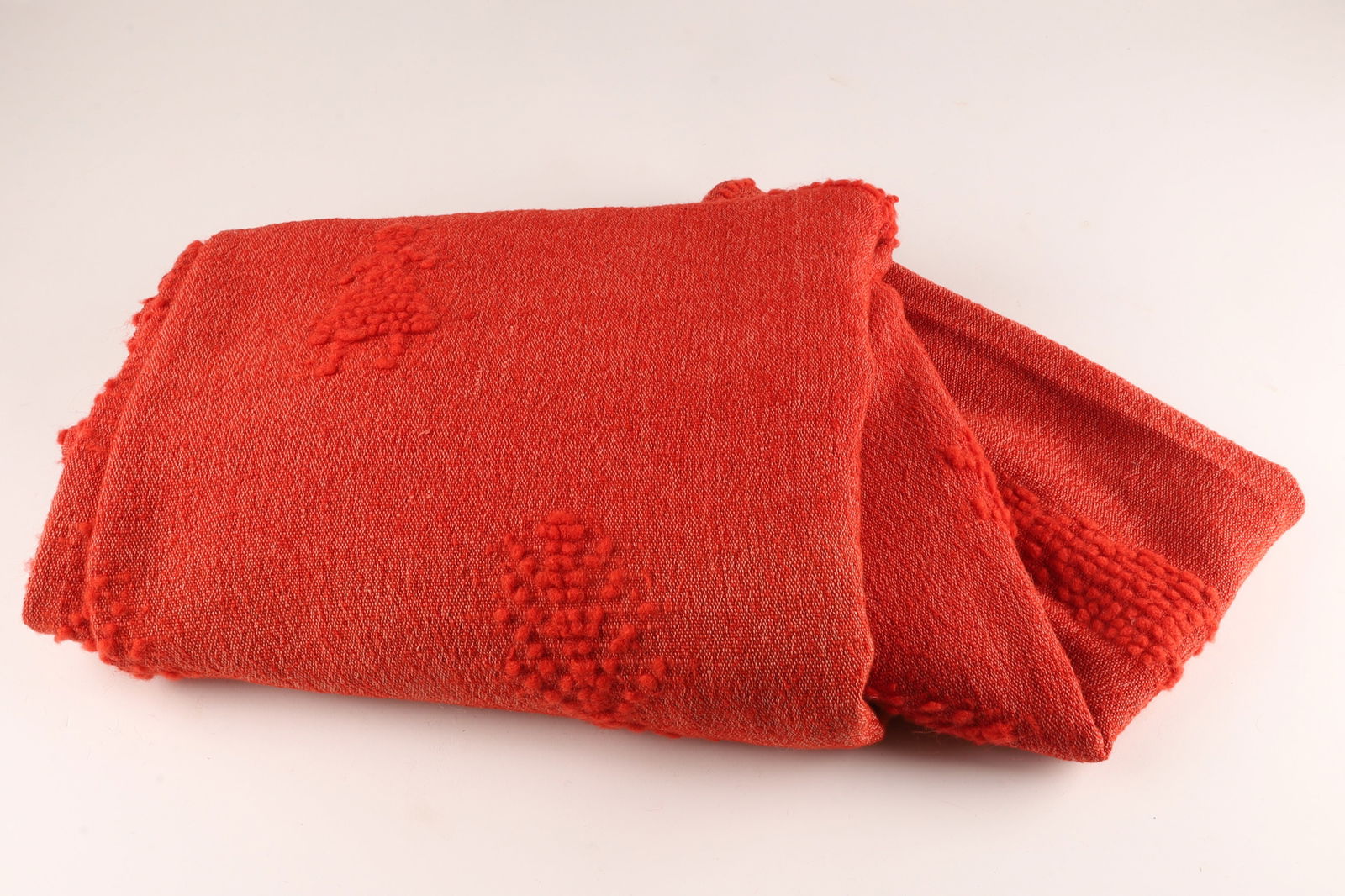 Canadian Handicrafts Guild Woven Red Figural Blanket: Canadian Handicrafts Guild Woven Red Figural Blanket. Decorated with figures surrounding an 8 pointed star or sun. Measuring 60” x 88”. 