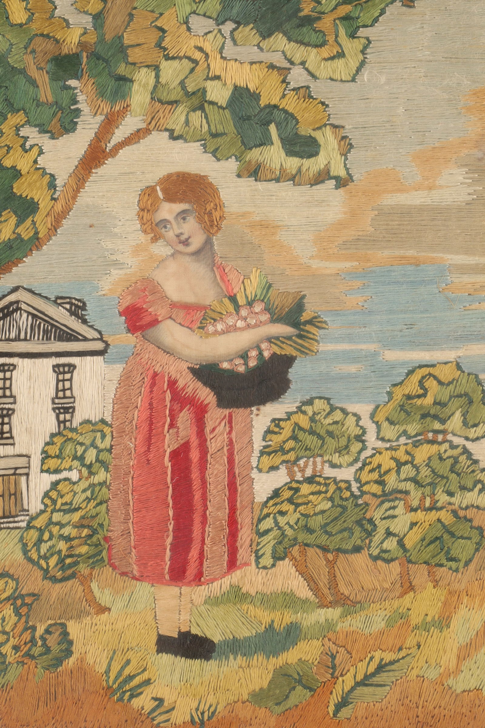 19th c. Colonial American Silk Embroidery Portrait of a Woman in Landscape: 19th c. Colonial American Silk Embroidery on Linen Portrait of a Woman with finely painted features in Landscape holding a basket. Framed, measuring 12”H x 10”W. Deaccessioned from the Smi