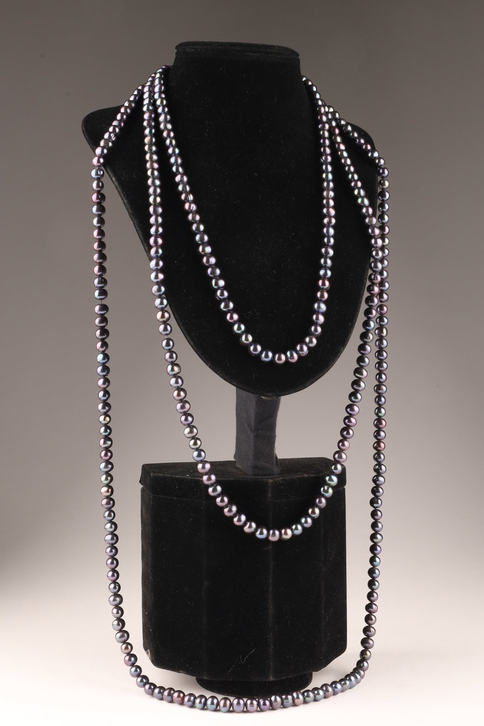 Long Opera Length Strand of Black Pearls with 14k Gold Clasp: Long Opera Length Strand of Black Pearls with 14k Gold Clasp. Measuring 96” L.
