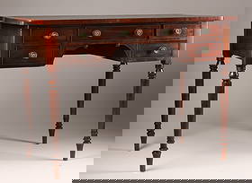 Regency Mahogany Writing Desk, Early 19th Century: Regency Mahogany Writing Desk, Early 19th Century Elegant English Regency mahogany writing desk featuring four drawers with original turned pulls, brass inlay trim, and partial turned supports, likel