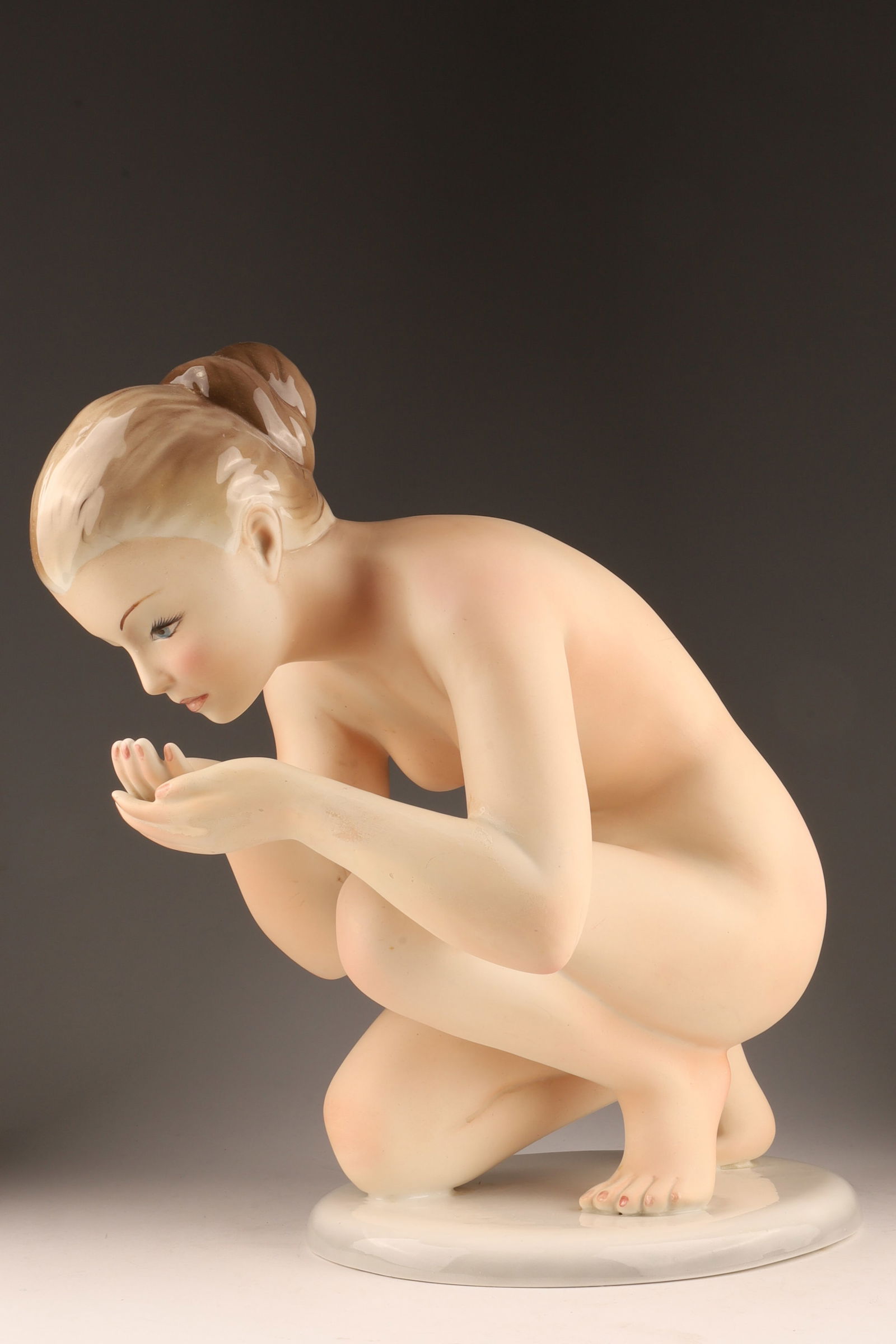 Large 1950s Favaro Cecchetto Italy Nude Kneeling Lady Figurine: Large 1950s Favaro Cecchetto Italy Nude Lady Figurine, Porcelain and bisque, some repaint to figure. Marked on underside. Measuring 14” x 15” x 8”.