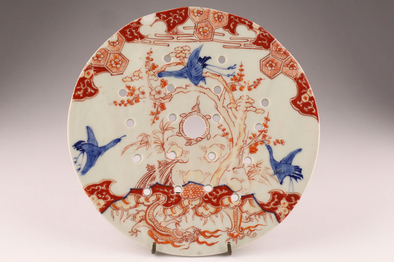 Antique Chinese Japanese Style Imari Porcelain Strainer: Antique Chinese Japanese Style Imari Porcelain Strainer, decorated with turtle and cranes. Small chips to rim, measuring 8 inches.