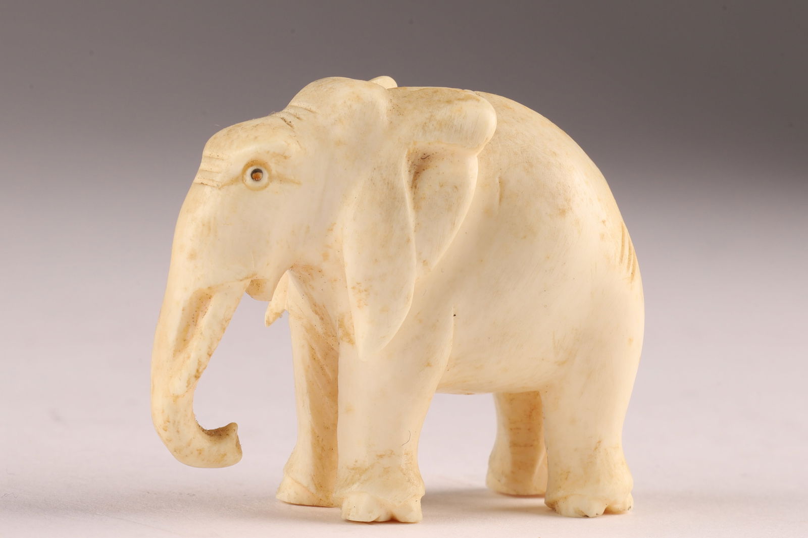 Small Carved Japanese Okimono form of an Elephant (1 of 5)