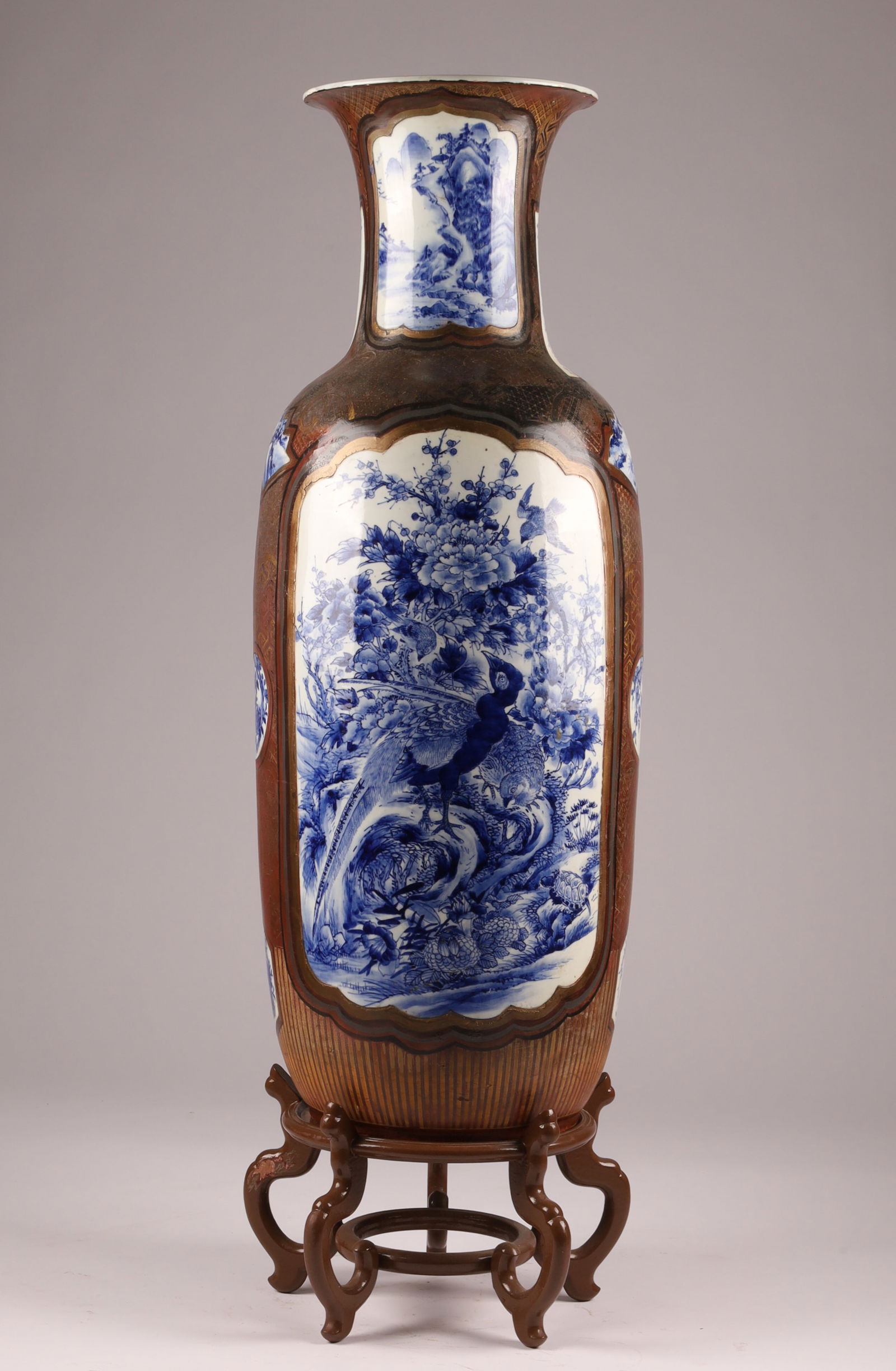 Very Large Antique Japanese Blue and White Floor Vase, Brown and Gilt Decoration: Very Large Antique Japanese Blue and White Floor Vase, Brown and Gilt Decoration, baluster form with flared rim, with calligraphy on neck. Decorated with landscapes of mountains, peonies and cherry bl