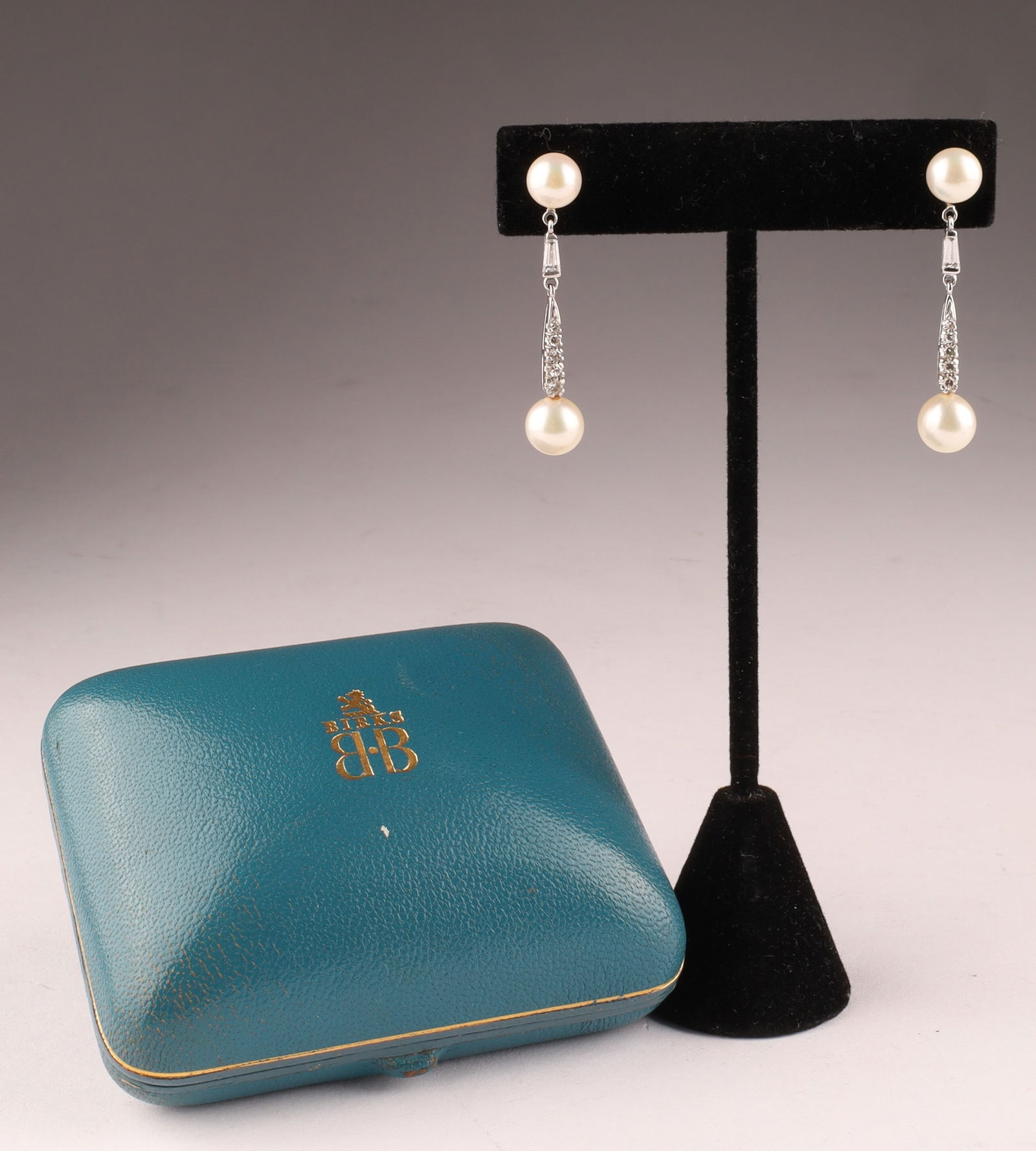 A pair of signed Birks diamond and Akoya pearl drop earrings (1 of 5)