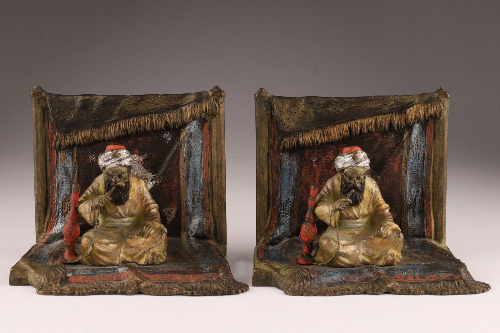 Pair Antique Austrian Bronze Orientalist Hookah bookends C. 1920s: Vienna bronze bookends c.1920s - cold painted Austrian bronze, featuring Middle Eastern theme. 4 inches H x 4.5 W