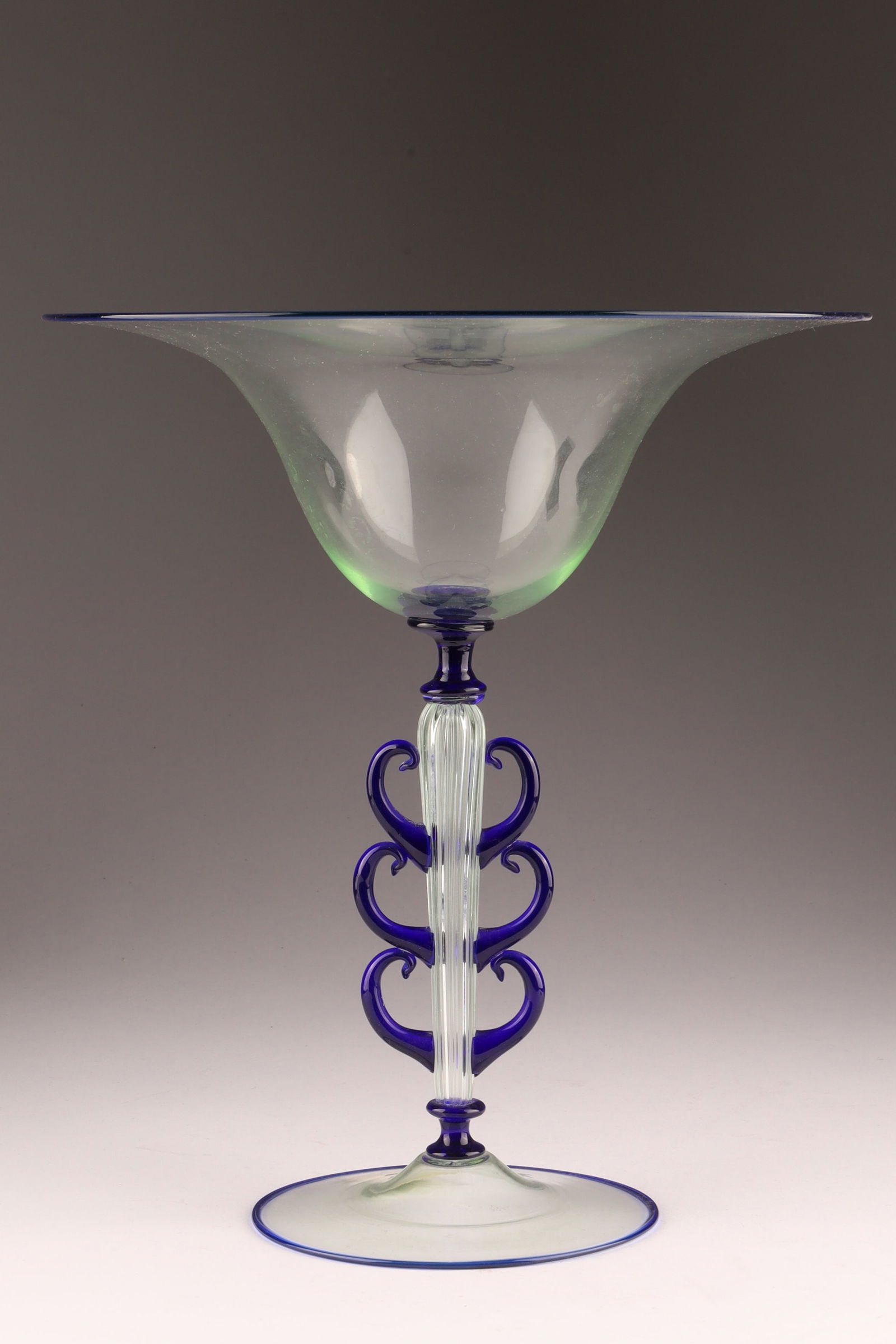 RARE VENETIAN UMBERTO BELLOTTO Art Glass Tazza, Blue Heart Decor: This tazza, designed by Umberto Bellotto between 1925 and 1928, is a delicate glass goblet with applied cobalt blue decoration and original Pauly and Co paper label. A very rare example. From the