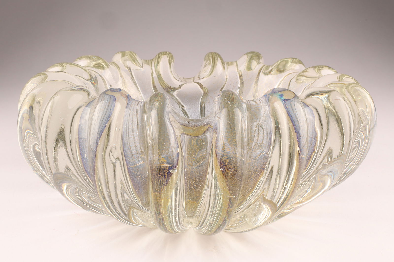 BAROVIER 1930s Iridati Heavy Fluted Art Glass Bowl, Clear with Gold Inclusions: This Barovier bowl dates to the 1930s and features the iridati technique. Measuring 9 inches W x 4 H. From the collection of a prominent glass collector from Toronto.