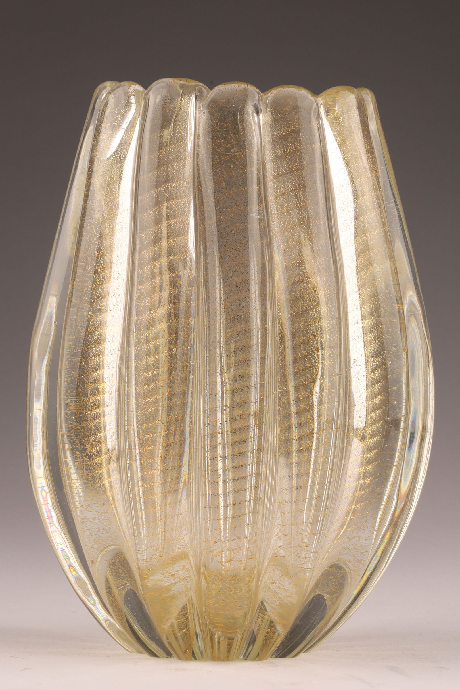 A.VE.M. Attributed Murano Cordonato D’oro Textured Vase: Attributed to A.Ve.M. in the 1960s, this vase features the cordonato d’oro technique. Measuring 7 inches H x 5 W. From the collection of a prominent glass collector from Toronto.
