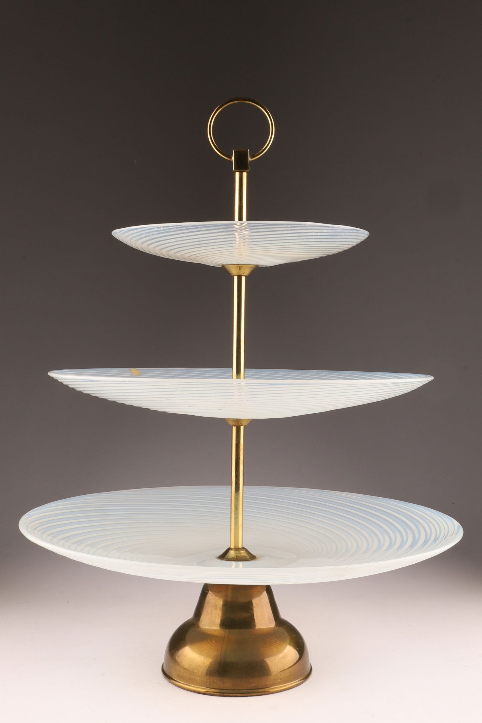 1940s Italy Opalescent and Gold Art Glass Salviati Three Tier Serving Stand: 1940s Hollywood Regency Opalescent and Gold Art Glass Salviati Three Tier Serving Stand with gilt brass hardware and original foil export stickers Venitian Italy. 13 inches W at base x 18 H.