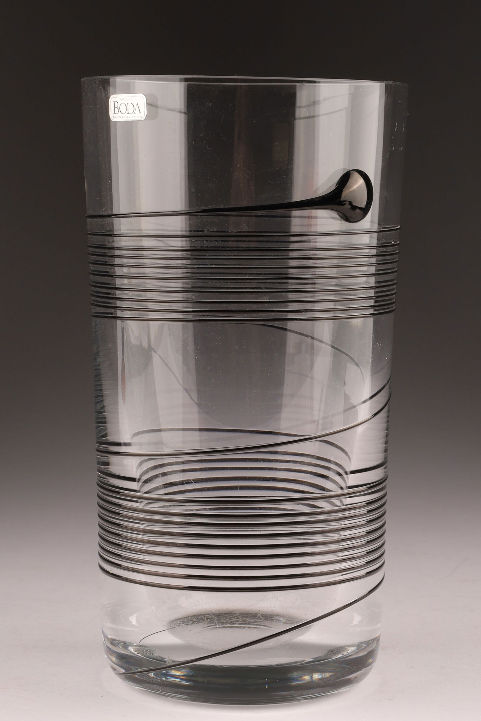 Signed Modernist Art Glass Bertil Vallien Kosta Boda SPIN Vase.: Signed Modernist Art Glass Bertil Vallien Kosta Boda SPIN Vase. With original sticker. 7.25 inches H x 4 W.