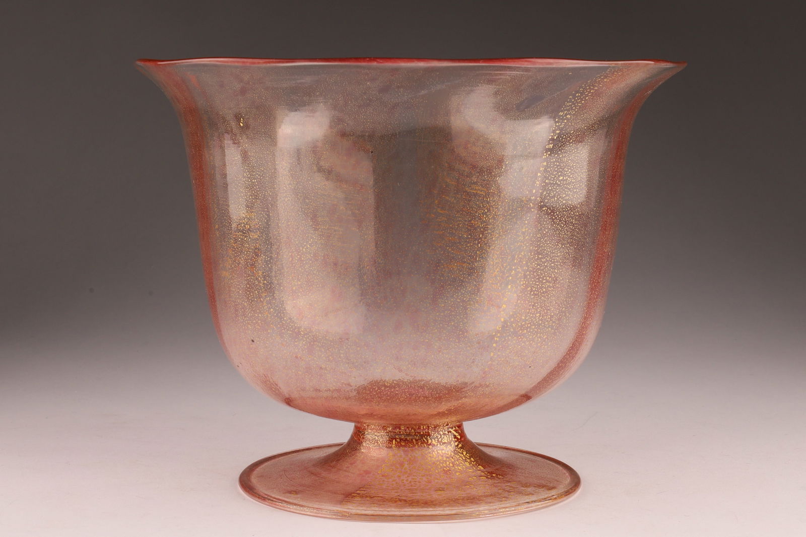 Vittorio Zecchin (1878-1947) Soffiato Glass Pink with Gold Flecks Footed Vase: Vittorio Zecchin (1878-1947) Soffiato Glass Pink with Gold Flecks Footed Urn Vase, Flared Rim. Measuring 6 inches H x 7.5 W.