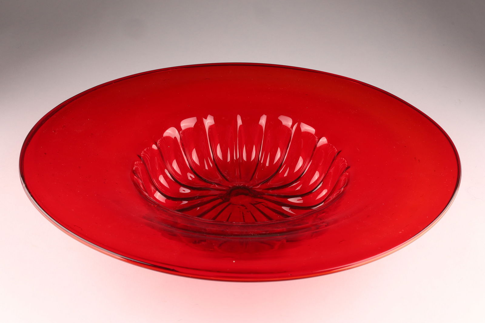 Vittorio Zecchin (1878-1947) (Attr.) Italy Veronese Crimson Red Murano Glass Lobed Bowl: Vittorio Zecchin (1878-1947)(Attr.) Italy Veronese Crimson Red Murano Glass Lobed Bowl with wide edge and folded rim. Unsigned, measuring 12 inches diameter x 2.5 H.