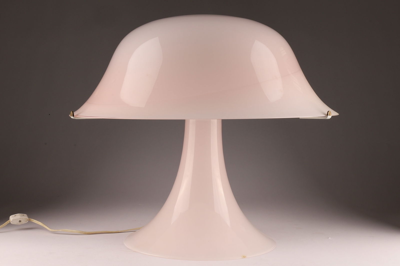 Large MCM Pink Art Glass Murano Cenedese Table Lamp: Large Mid Century Pale Pink Art Glass Murano Cenedese Table Lamp. Glass shade supported by metal frame sitting on a glass base. Measuring 18 inches W x 17 H.