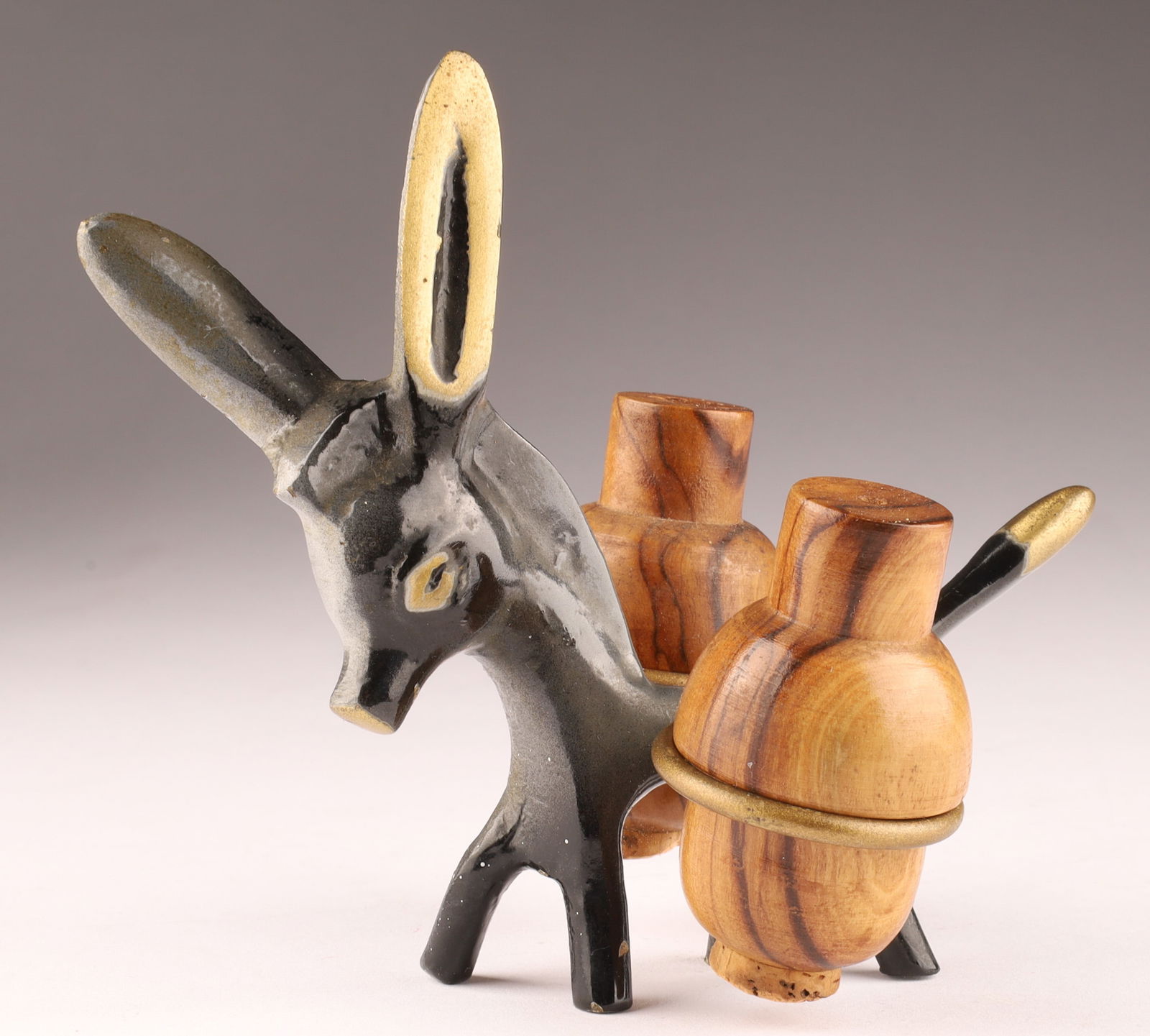 Mid Century Walter Bosse Donkey Salt & Pepper Set: Mid Century Walter Bosse donkey olive wood salt and pepper shaker set for Herta Baller. Measuring 4 inches H x 4.5 W.