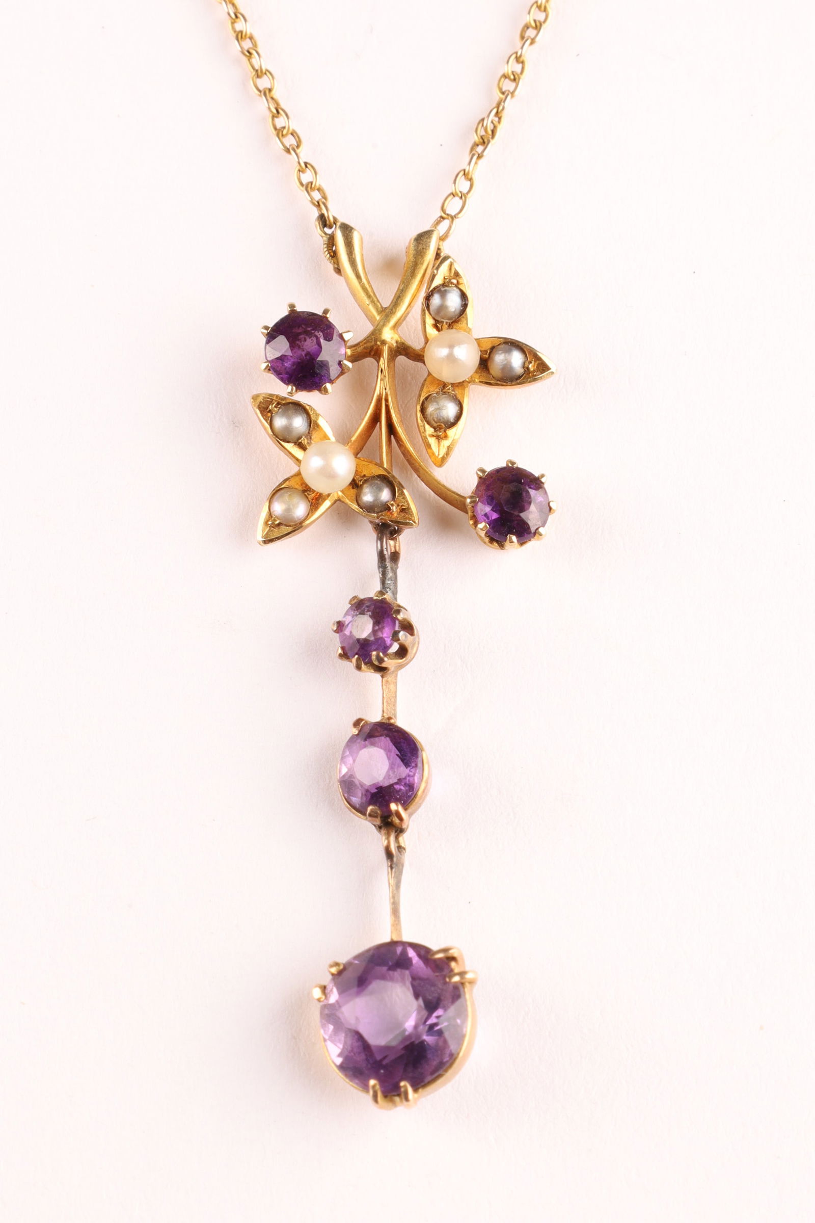 14K Gold Antique Edwardian Amethyst and Seed Pearl Lavalier Necklace: 14K Gold Antique Edwardian Amethyst and Seed Pearl Lavalier Necklace. Measuring 17 inches L, pendant measures 1.5 inches, 4.1 grams total weight.