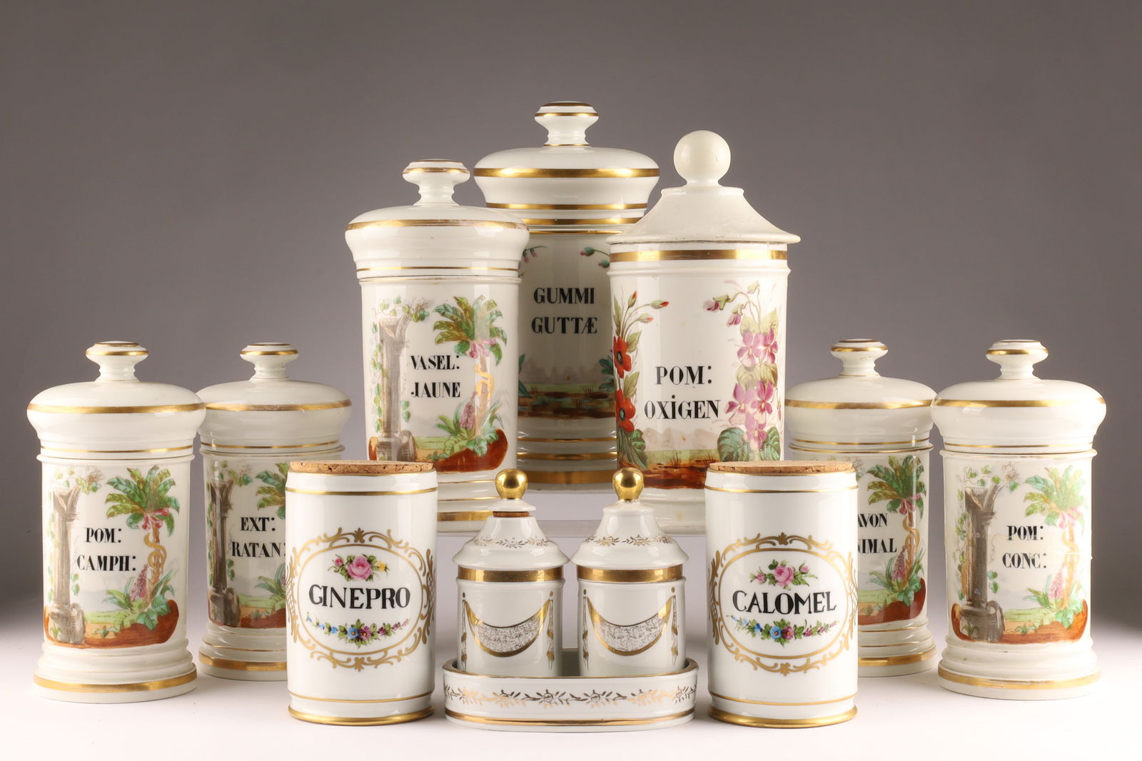 Large Collection of Antique French and Italian Hand Painted Porcelain Apothecary Jars: Large Collection of Antique French and Italian Hand Painted Porcelain Apothecary Jars with lids. Material: Ceramic/porcelain with hand-painted enamel and gilt details. Design: Each jar