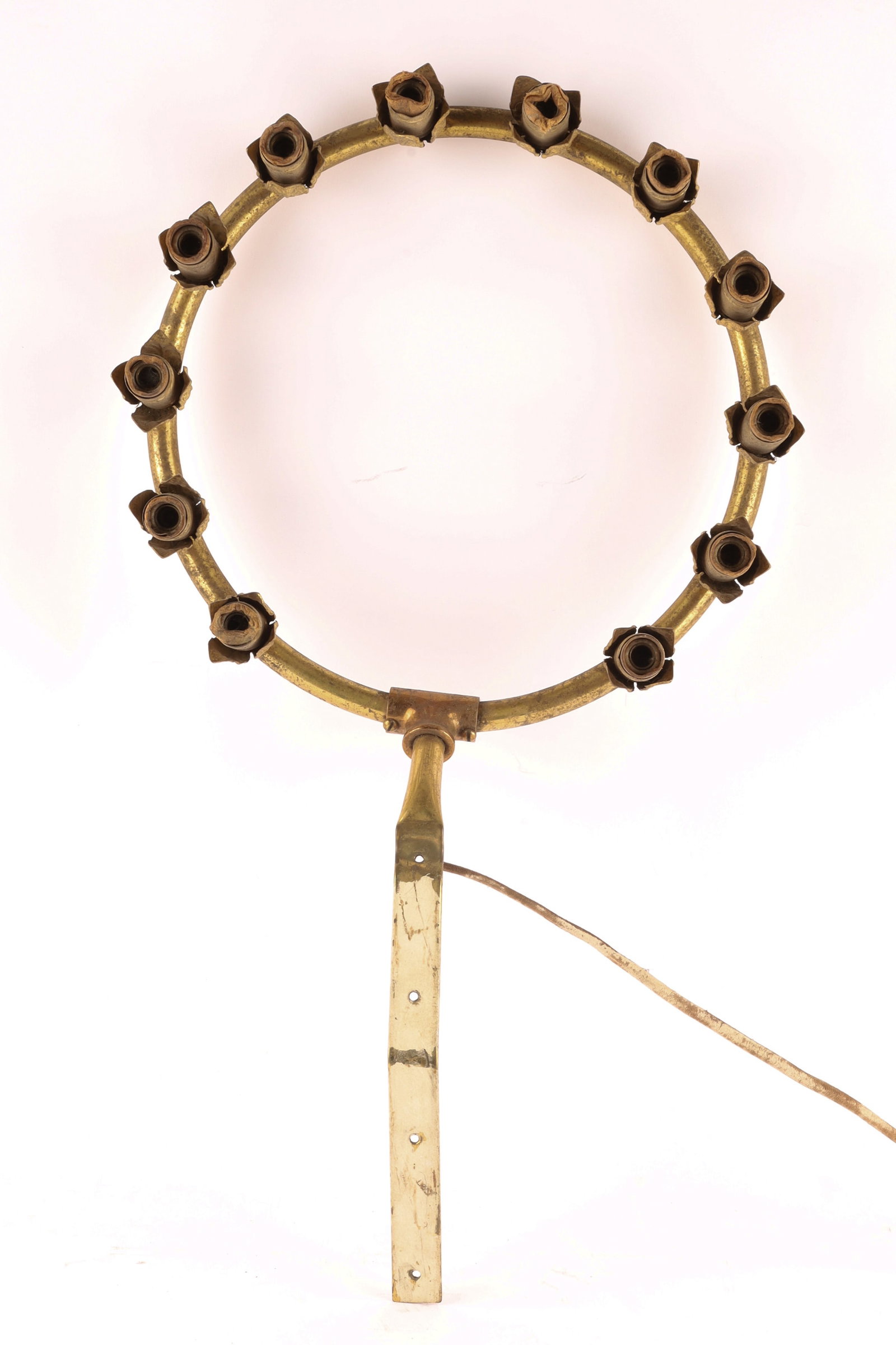 Brass Halo Aureole Crown for Religious Statue: Brass halo or aureole crown for a religious statue of the Virgin Mary or other saints. It features a circular ring with 12 small sockets for light bulbs and includes a stem for mounting behind