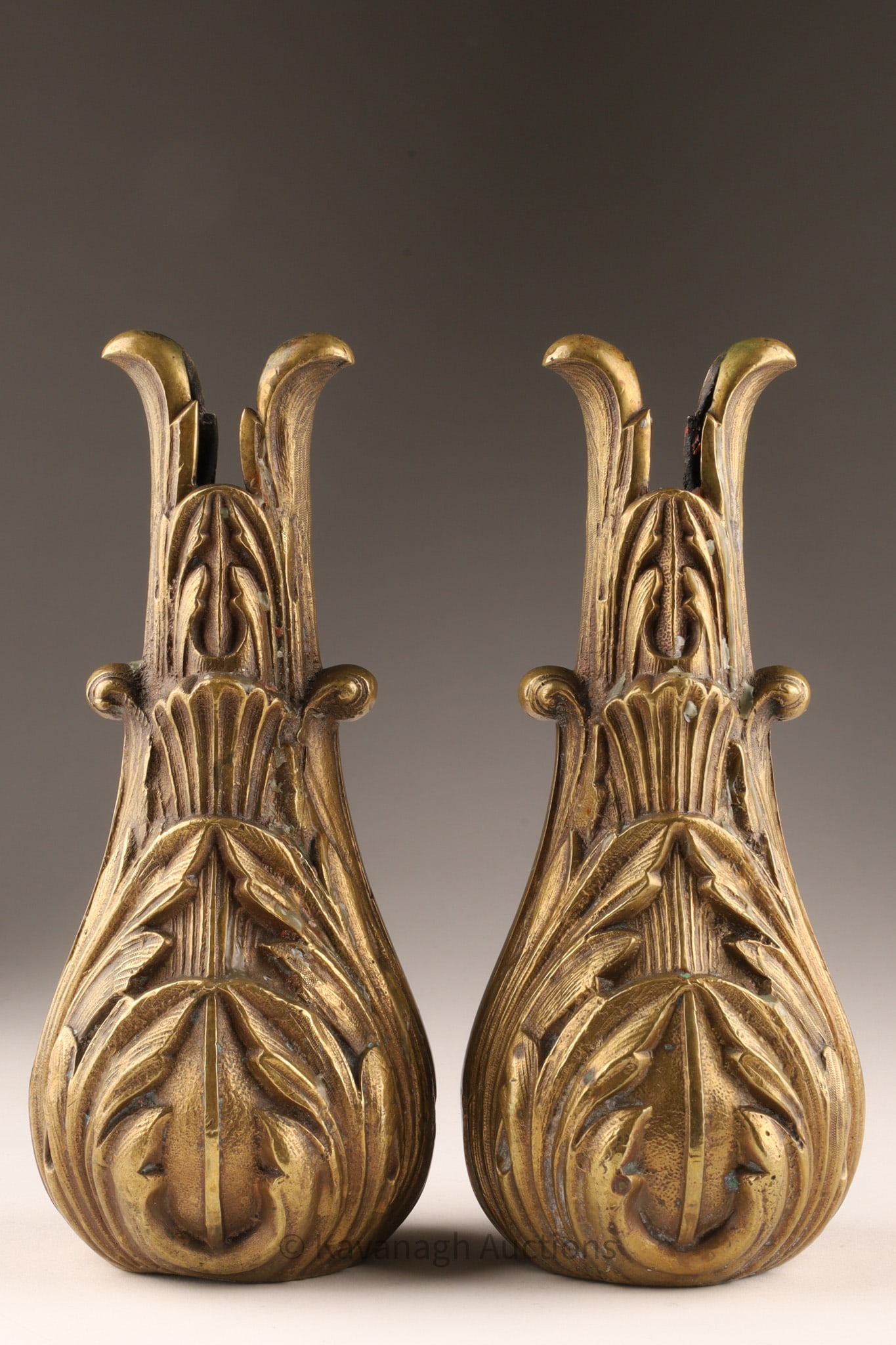 Pair of Antique Art Nouveau Bronze Floral Vases: Pair of Antique Art Nouveau Bronze Floral Vases or candle holders. Measuring 8 inches H x 3.5 W. Style: These pieces are crafted in the Art Nouveau style, characterized by organic, flowing lines and